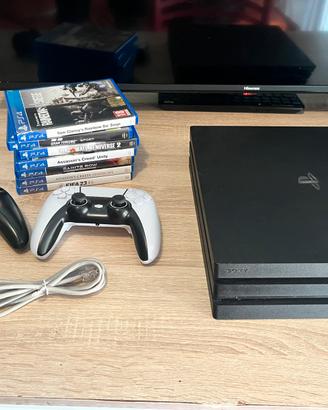 ps4 pro  con giochi due joystick e cavo lan