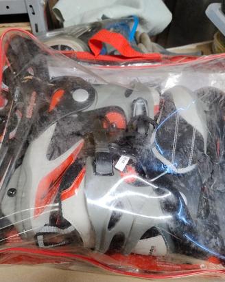 pattini a rotelle con borsa e protezioni