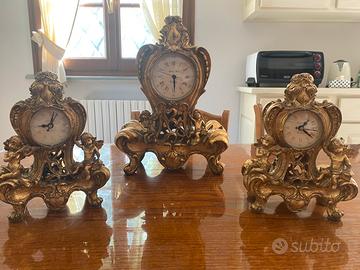Orologi da tavolo /mobile dorati grandi/piccoli