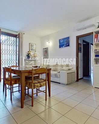 Trilocale con giardino privato, box e cantina
