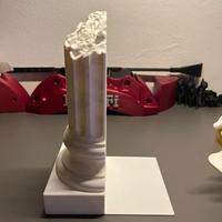 Reggilibri con colonna greca rotta