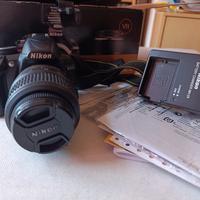 Nikon D3100 + 18-55mm