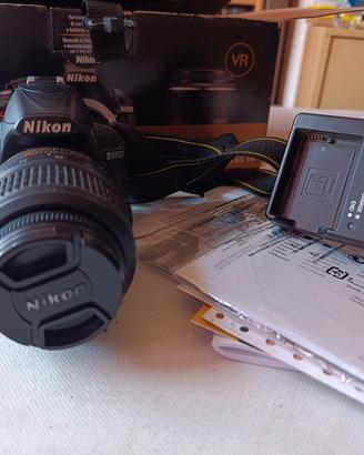 Nikon D3100 + 18-55mm