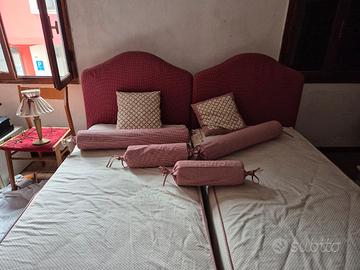 due letti singoli doghe in legno rivestiti