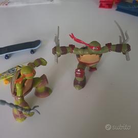 coppia statuette tartarughe ninja