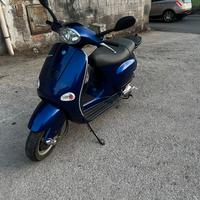 Vespa et4 125