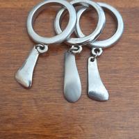 anello 3pz in acciaio con pendenti