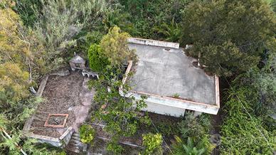 Terreno con casa rustica