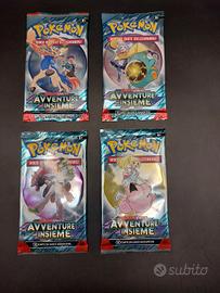 carte pokemon pacchetti avventure insieme