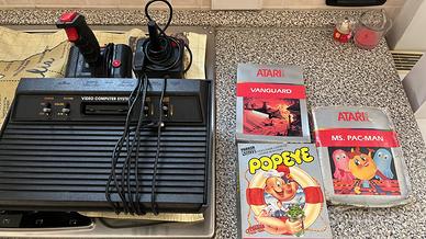 Console atari 2600 nera con giochi nintendo