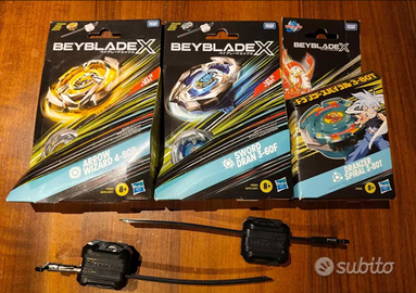 Beyblade x trottole + lanciatori
