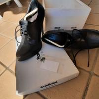 Scarpa e stivale entrambi seminuovi TG. 35