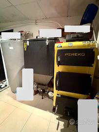 Caldaia multi combustibile + bollitore + panelli