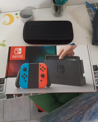 Nintendo switch xaj4001 + SD 128 gb scatolata