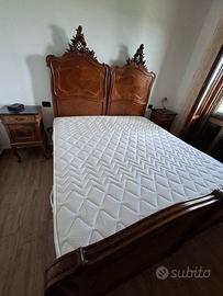 camera da letto con rete e materasso