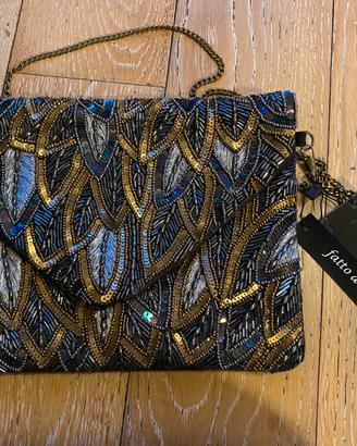 Pochette da donna nuova con cartellino