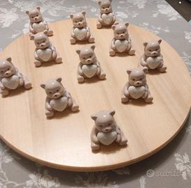 orsetti in ceramica e ampolle in vetro con tappo 