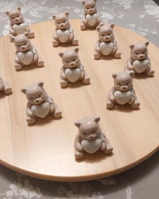 orsetti in ceramica e ampolle in vetro con tappo 