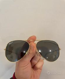 Occhiali da sole Ray-Ban a goccia dorate