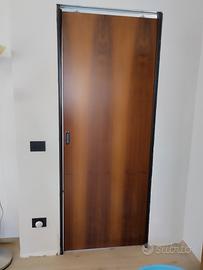  3 porte scorrevoli in rovere.