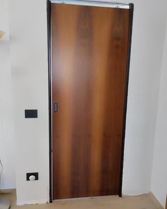  3 porte scorrevoli in rovere.