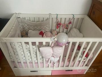 lettino a cancelli con cassetti