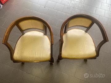 Coppia di poltroncine a pozzetto