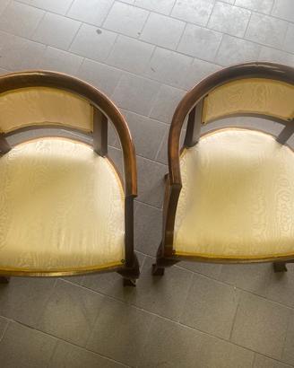 Coppia di poltroncine a pozzetto