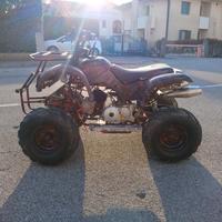 quad 125