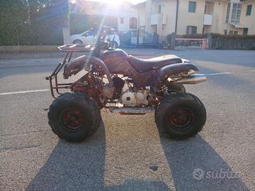 quad 125
