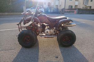quad 125