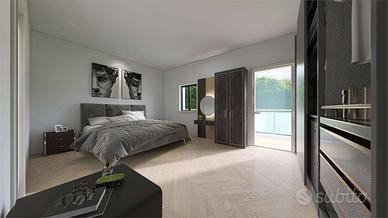 Casa su due livelli con giardino privato e garage