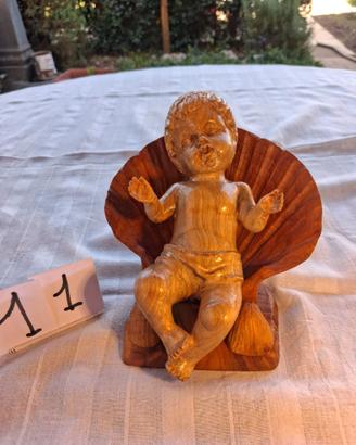 Gesù Bambino su capasanta a tutto tondo