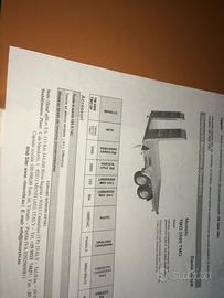 Rimorchio gemellato con sponde e scivoli