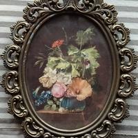 cornice ovale in bronzo con finitura anticata 