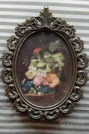 cornice ovale in bronzo con finitura anticata 