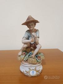 Statua porcellana Capodimonte contadinello Scotto