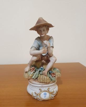 Statua porcellana Capodimonte contadinello Scotto