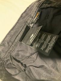 Pantalone e scarpe moto donna