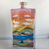 Bottiglia deco con sabbia colorata