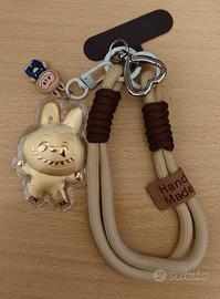 Portachiavi / laccio per telefono con personaggio 