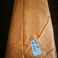 Scampolo tessuto crespato arancione