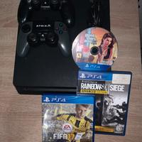 ps4 con giochi e controller
