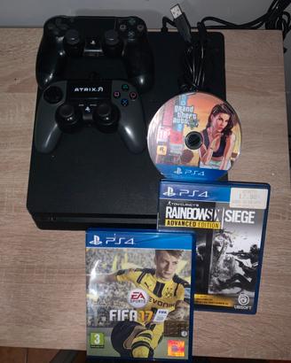 ps4 con giochi e controller