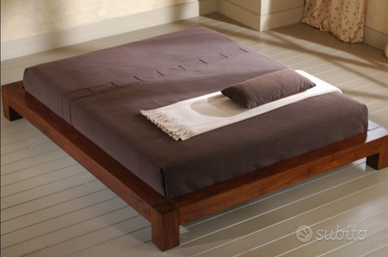 Struttura letto stile etnico/orientale