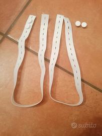 elastici con asole e bottoni spostabili 