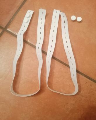 elastici con asole e bottoni spostabili 