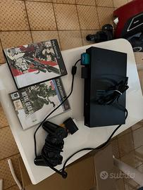 Playstation 2 + un controller + Metal Gear 2 e 3