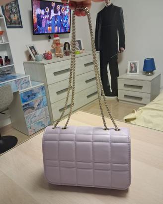 Borsa trapuntata lilla con tracolla a catena
