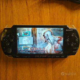 PSP Slim nera con GTA originale - batteria